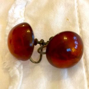 Earliest 1930s root beer lucite screw back earrings.